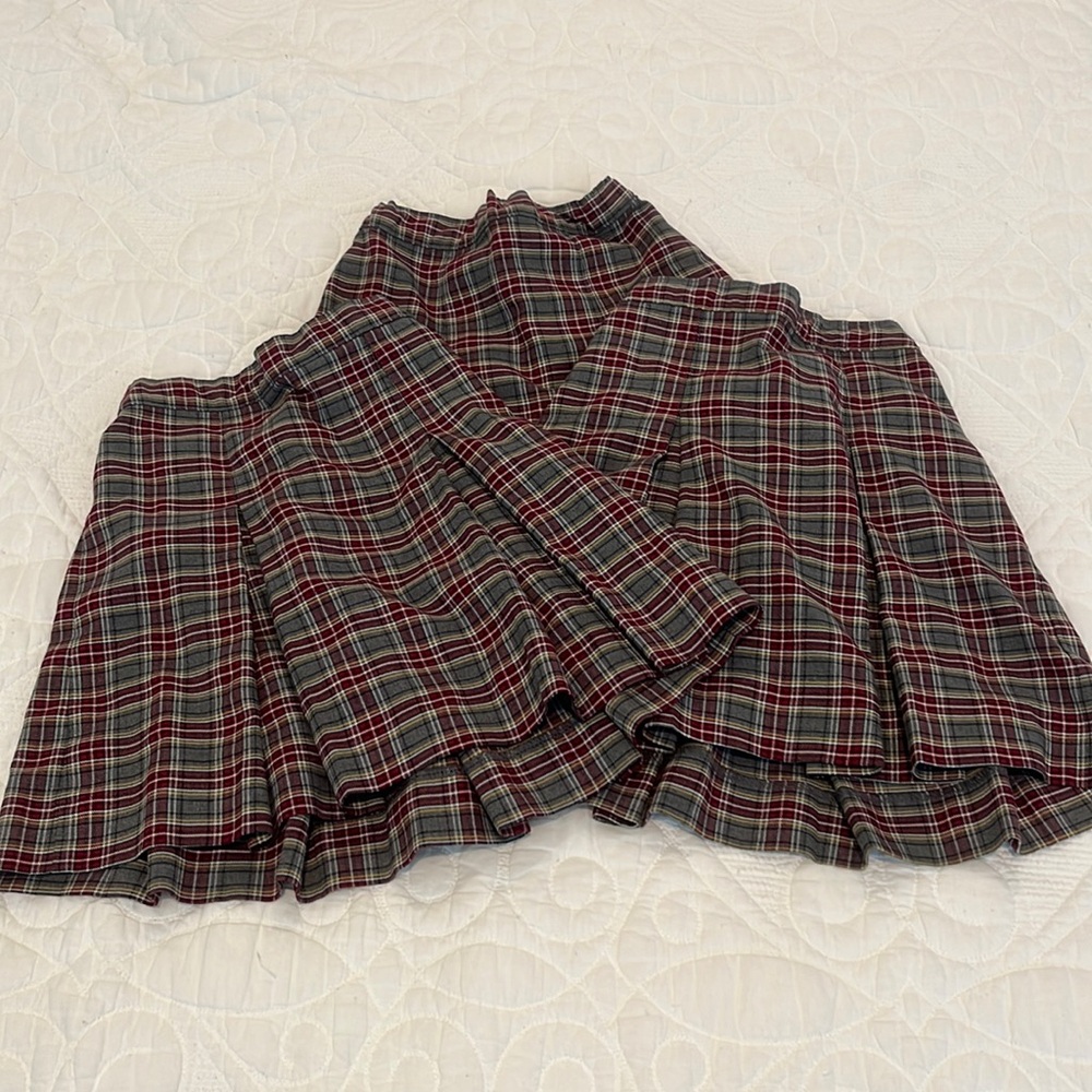 Challenger School pleated skirts